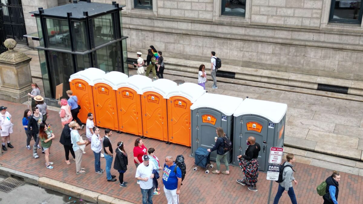 Clean portable restrooms set up for a parade event, ensuring comfort for spectators and participants.