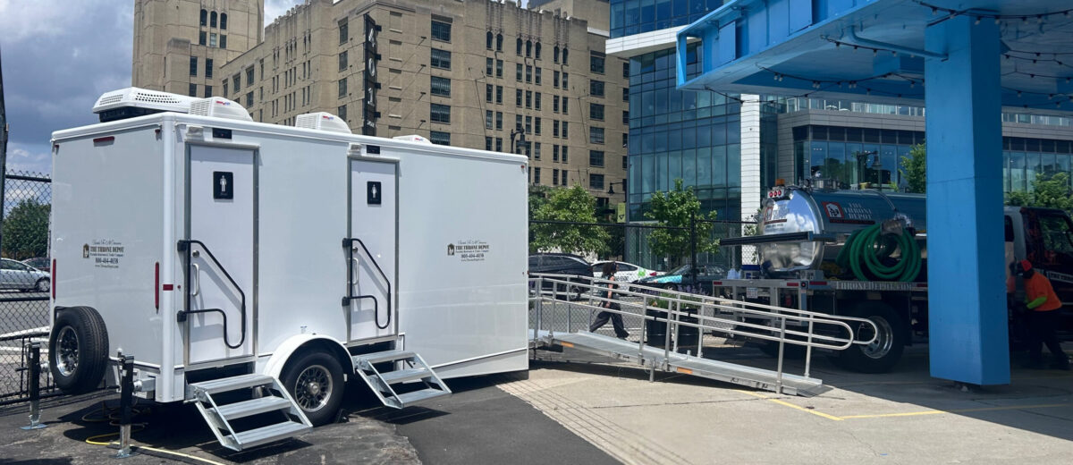 Restroom trailer set up on a construction site to provide workers with clean and comfortable facilities