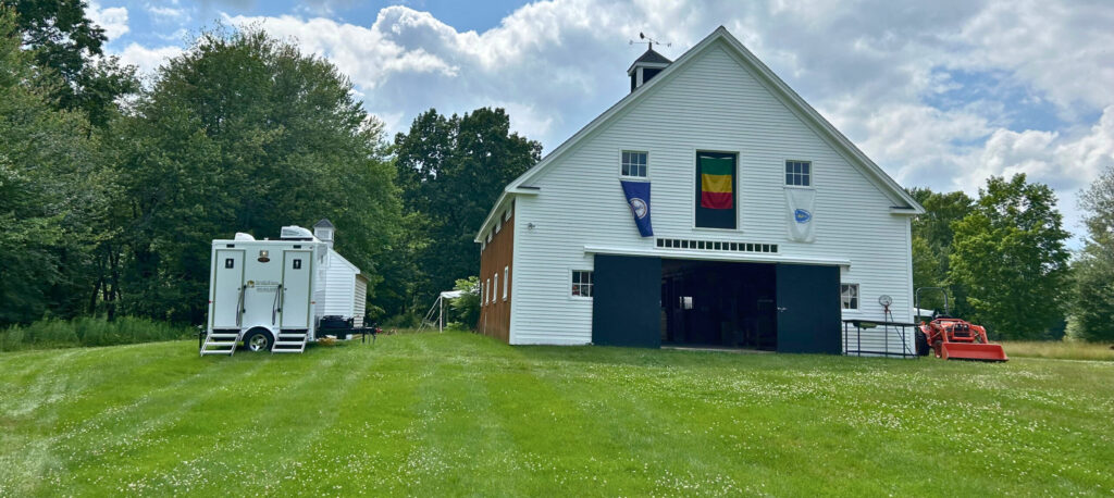 Luxury restroom trailer set up at a special event providing upscale guest amenities