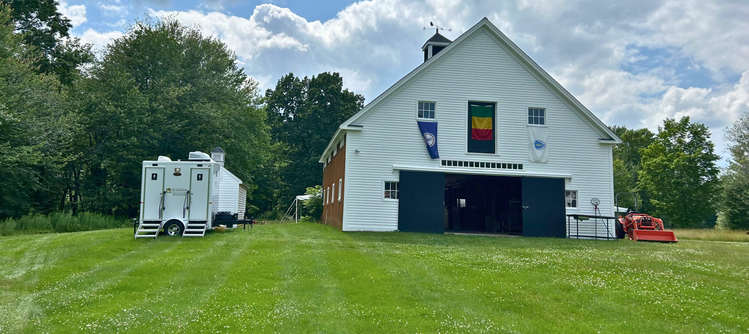 Luxury restroom trailer set up at a special event providing upscale guest amenities