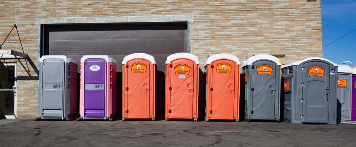 Portable toilets set up on-site illustrating what goes into porta potty rental costs