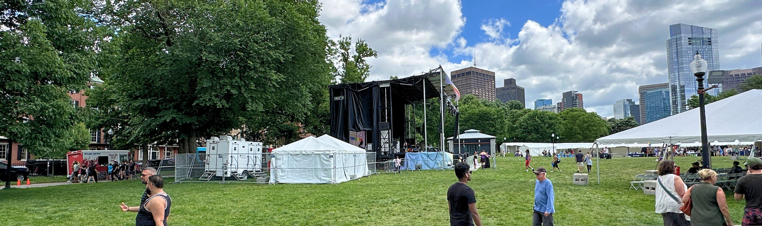 Portable restroom trailer set up at a festival, showing one of the many restroom trailer options available for events