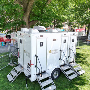 Luxury wedding restroom trailer exterior showing entrances and setup for an elegant event