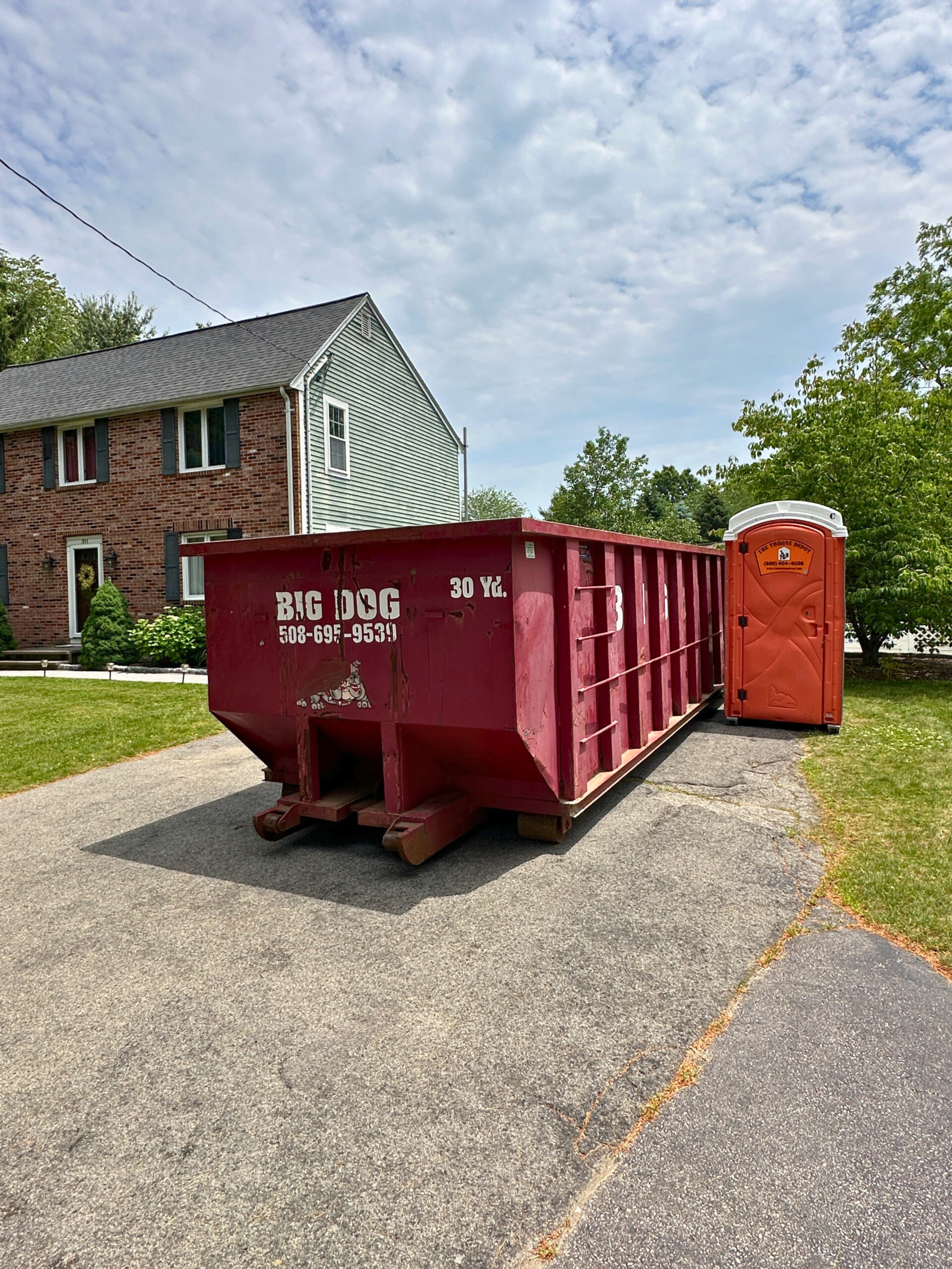 Portable toilet set up at a residential remodeling job site